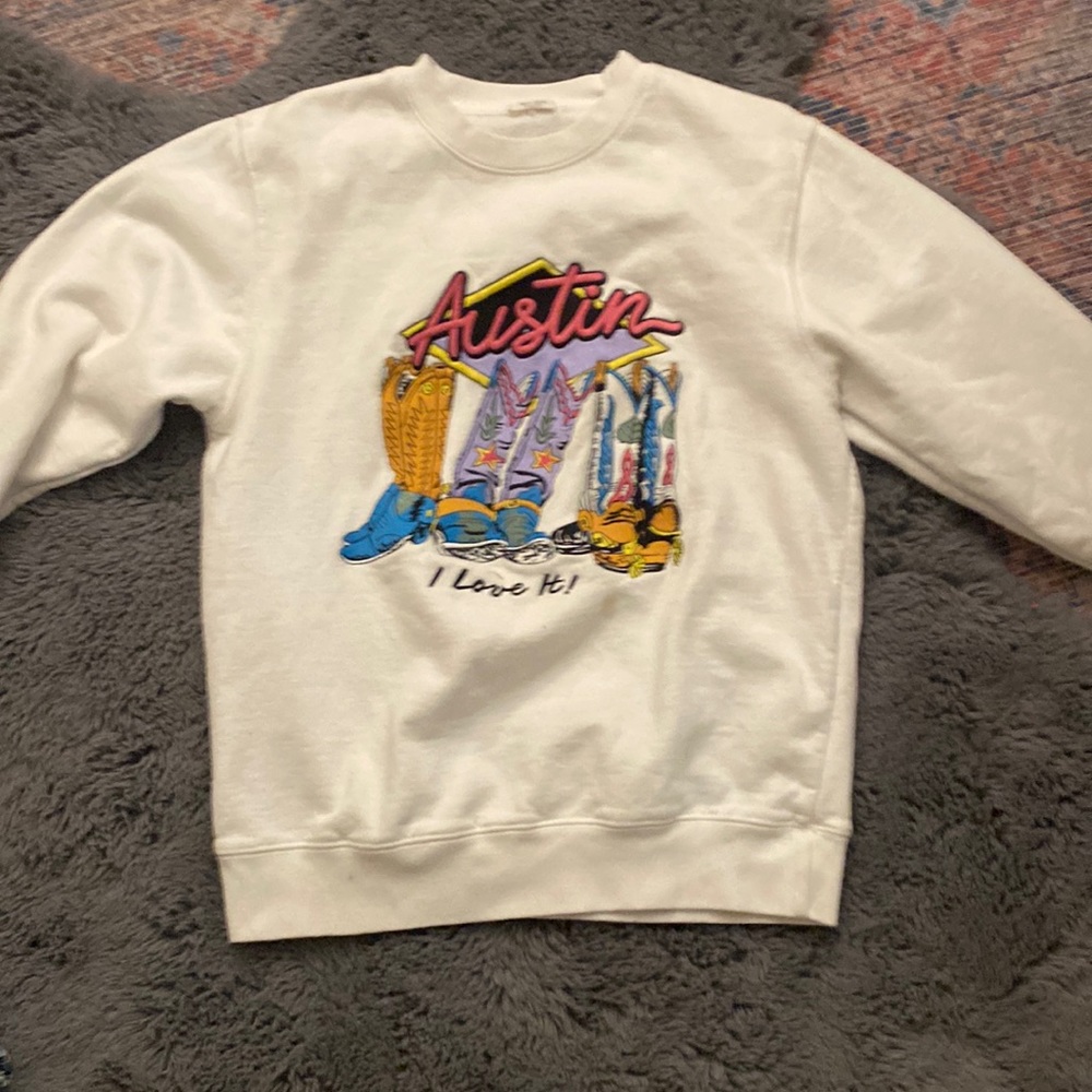 White crewneck with Austin and boots embroidered on it no stains super cute